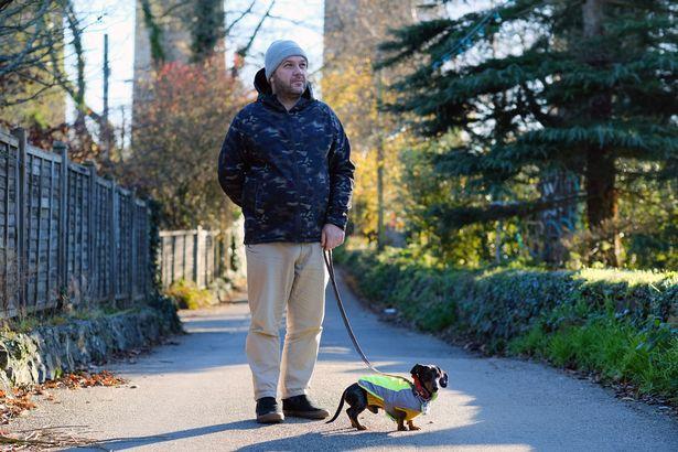 Angarrack resident Dan Amos taking his dog Ziggy for walk in the village (Image: Greg Martin / Cornwall Live) Angarrack resident Dan Amos taking his dog Ziggy for walk in the village (Image: Greg Martin / Cornwall Live)